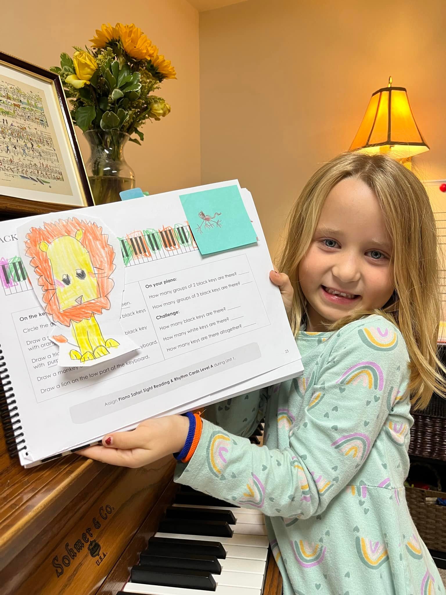 A young student sharing her completed music work